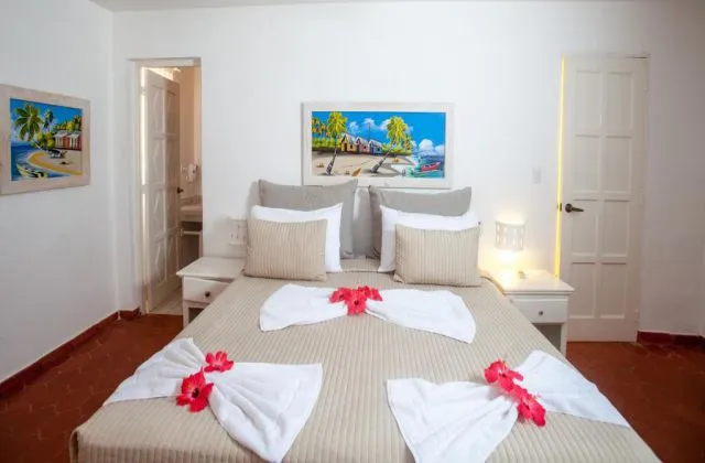 Los Corales Village Punta Cana room bed king size
